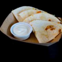 Kid'S Cheese Quesadilla · cheese quesadilla served with lime crema