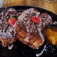 Vanilla Brioche French Toast · Thick-sliced brioche dipped in a sweet custard  that creates the most tender, buttery, luxur...