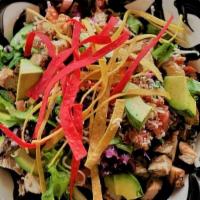 T&T Salad/ Chicken · Mixed greens, cabbage, carrots, tomato, avocado, bacon, cheese & tortilla strips.