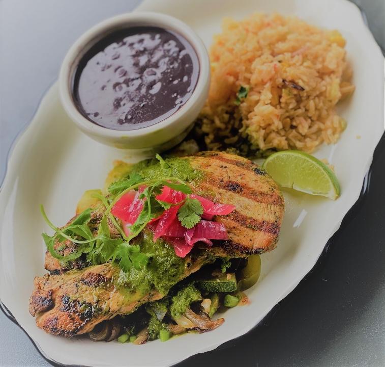Chimichurri Chicken · Marinated grilled chicken breast with chimichurri salsa. Served with grilled seasonal vegetables, Mexi-rice and black beans. Topped with pickled red onions.
