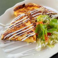 Cheese Quesadilla · Giant flour tortilla grilled with choice of meat and melted cheese. Served with lettuce, tom...