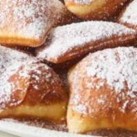 Beignets · Ten fluffy and dusties