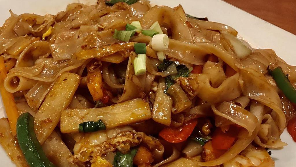 Drunken Noodles (Pad Kee Mao) · Sautéed wide rice noodle with egg, bamboo shoot, bell pepper, onion, carrot and basil.