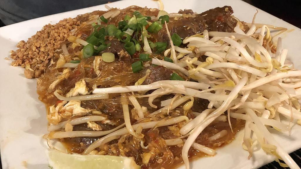 Pad Thai Woon-Sen · Glass noodle sautéed with egg, bean sprout and scallion topped with ground peanut and scallion.
