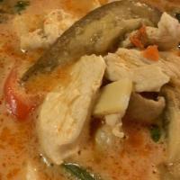Thai Red Curry · Red curry paste in coconut milk with bamboo shoot, pineapple, eggplant slices, bell pepper a...