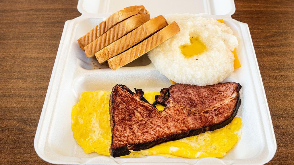 Country Ham · Served with a country ham steak, 2 eggs, grits, and toast. No substitutions permitted.