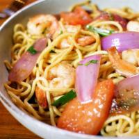 Tallarin Saltado · Stir Fried Noodles, Red Onions, Green Onions, Tomatoes, Cilantro & Aji Amarillo