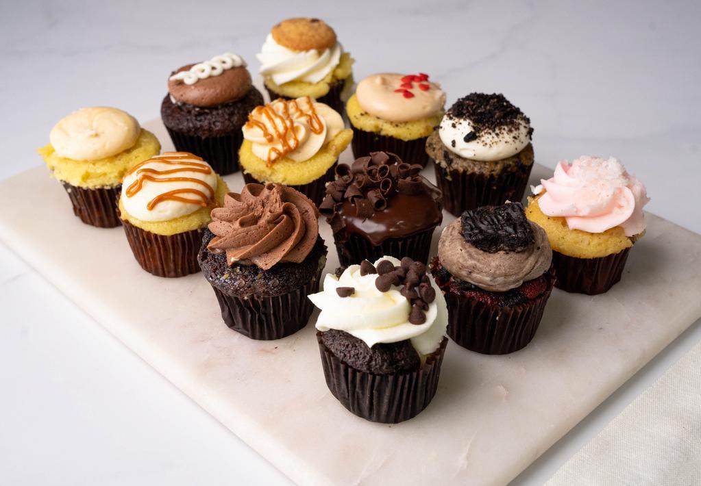 Local Favs 12 Pack Mini · 1 S'mores, 1 Cookie Dough, 1 Dulce DeLeche, 1 Salty, 1 Ganache, 1 Black Bottom, 1 Guava, 1 Oreo with Cream Cheese, 1 Red Velvet with Cream Cheese, 1 Coconut, 1 Chocolate w/ Chocolate & 1 4Leches