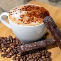 Cappuccino · 12 fl. oz. 

Espresso + thick microfoam + topped with Organic Cacao Powder