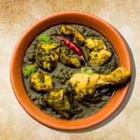 Chicken & Spinach · Indian curry of chicken cooked together with fresh spinach and spices