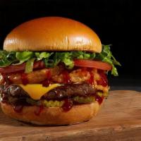 Impossible® Burger · One or Two, 4 oz. fresh Impossible® patties, Sweet Baby Ray's BBQ sauce, onion rings, lettuc...