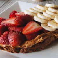 Fruity Toast · multigrain toast - almond or peanut butter - strawberries - bananas - local honey