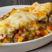 Shepherd'S Pie · Seasoned ground beef and pork, carrots, celery and corn in a rich brown sauce, topped with c...