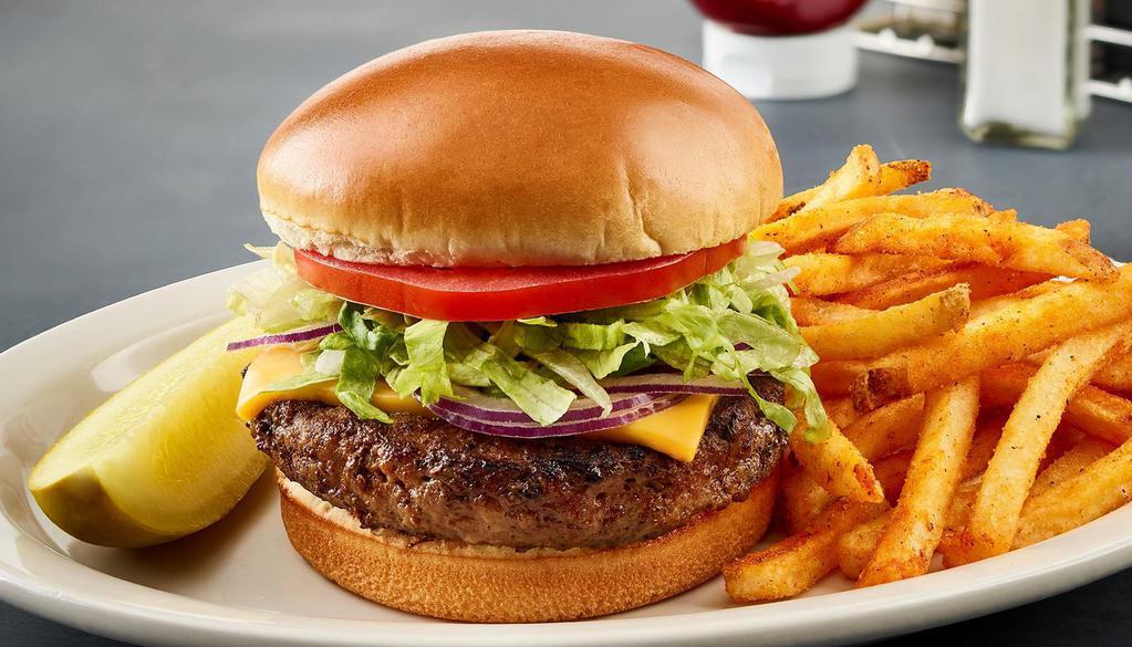 Classic Burger · 100% Angus burger, cheddar cheese,
lettuce, tomato, and red onions.