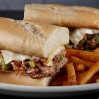 Philly Cheese Steak · Roasted and seasoned beef topped with grilled onions and peppers, melted provel cheese on a ...