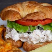 Chicken Salad Croissant · Roasted chicken, chopped pecans, grapes, celery and mayo served on a flaky croissant with le...