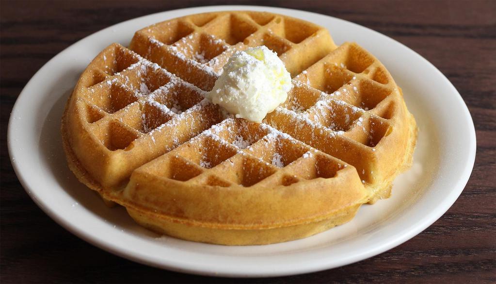 Belgian Waffle · Thick and light, a true Belgian waffle. Topped with powdered sugar.