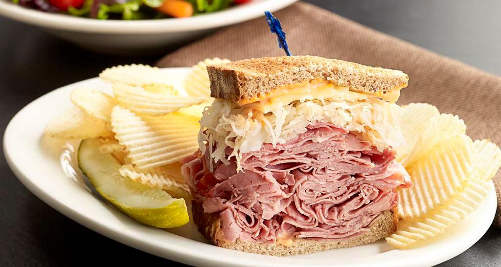 Reuben The Great With Pastrami (Manager'S Special) · A half sandwich served with your choice of a cup of soup, fresh fruit or Mac & Cheese. Hot pastrami, Swiss, sauerkraut, 1000 Island dressing, on toasted rye.