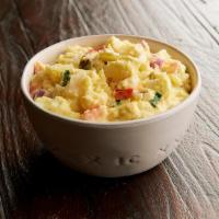 American Potato Salad  · A deli classic featuring baked potatoes, red and green onions, hard-boiled eggs, bell pepper...