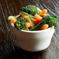 Steamed Veggies  · A healthy blend of steamed broccoli, cauliflower, zucchini and organic baby carrots.