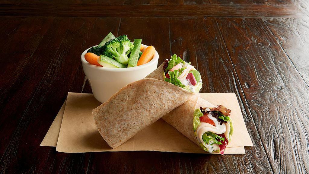 Turkey Wrap (Manager'S Special) · A half wrap served with your choice of a cup of soup, fresh fruit or Mac & Cheese. Roasted turkey breast, Roma tomatoes, organic field greens, guacamole, ranch dressing, in a toasted organic wheat wrap.