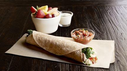Spinach Veggie Wrap Regular · Mushrooms, organic spinach, Asiago, guacamole, pico de gallo, in a toasted organic wheat wrap. Served with salsa. Choice of one side: fresh fruit, steamed veggies, baked chips or blue corn chips.