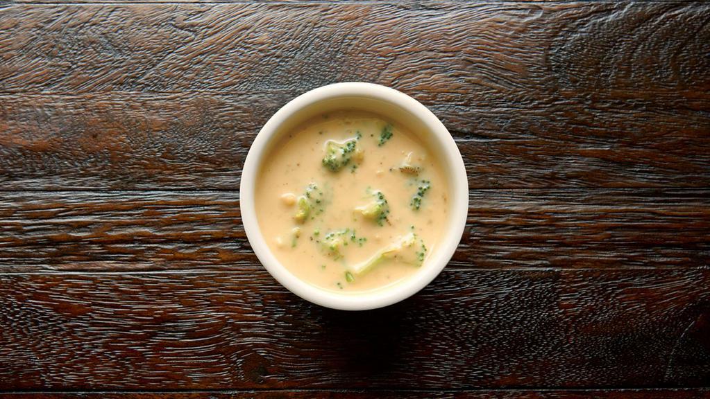 Cup Broccoli Cheese Soup · What makes our Broccoli Cheese Soup so popular? The richness of melted cheese, sweet cream, whole fresh green broccoli florets and onions lightly sautéed in butter. Many make it their soup choice for a Manager’s Special.