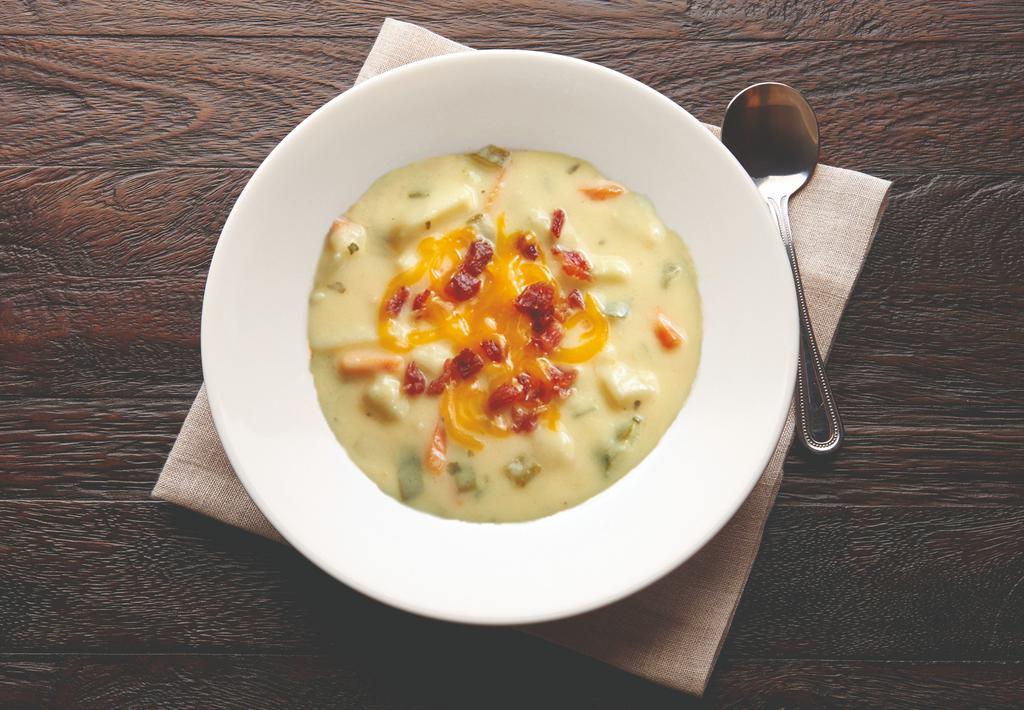 Bowl Irish Potato Soup  · Once a soup du jour, our creamy Irish Potato Soup has returned to our menu. Raise your spoon to potatoes, milk, sweet cream, sour cream, onions and carrots with a cheddar base in a savory chicken stock.
