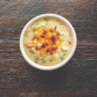 Cup Irish Potato Soup · Once a soup du jour, our creamy Irish Potato Soup has returned to our menu. Raise your spoon...