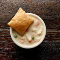 Cup Chicken Pot Pie  · Tender chicken, red potatoes, carrots, celery, green peas and spices are mixed with a creamy...