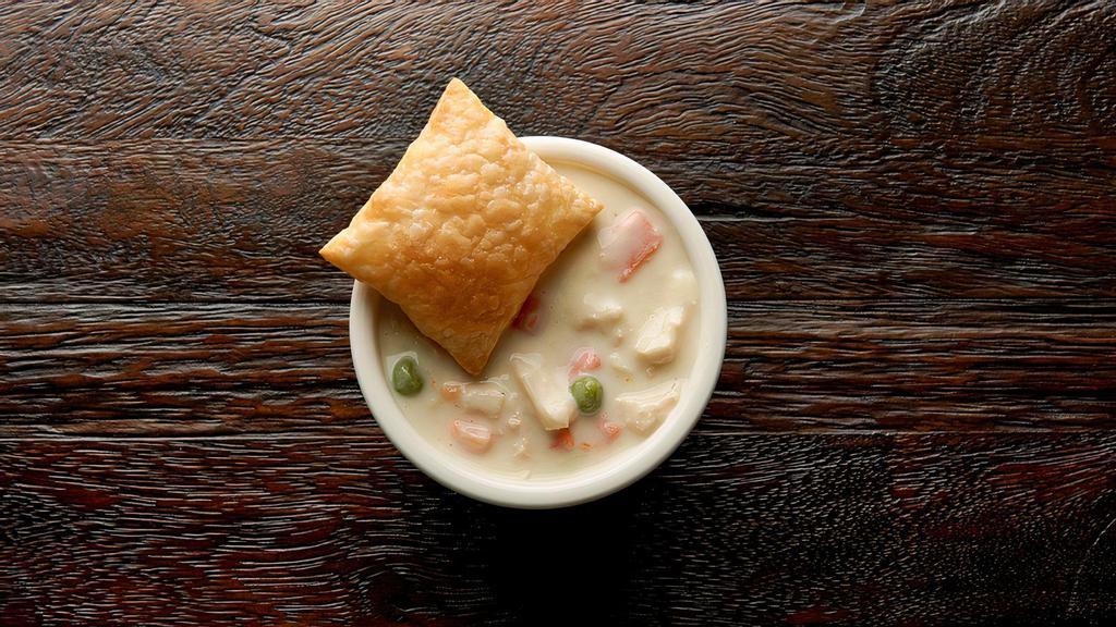Cup Chicken Pot Pie  · Tender chicken, red potatoes, carrots, celery, green peas and spices are mixed with a creamy sauce and topped with a golden, flaky puff pastry. In a bowl, it’s a meal. Our Chicken Pot Pie is simply scrumptious comfort food.