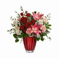 Teleflora'S Sleek Chic Bouquet · Make them swoon with this radiant red rose bouquet and artistic European glass vase. Its shi...