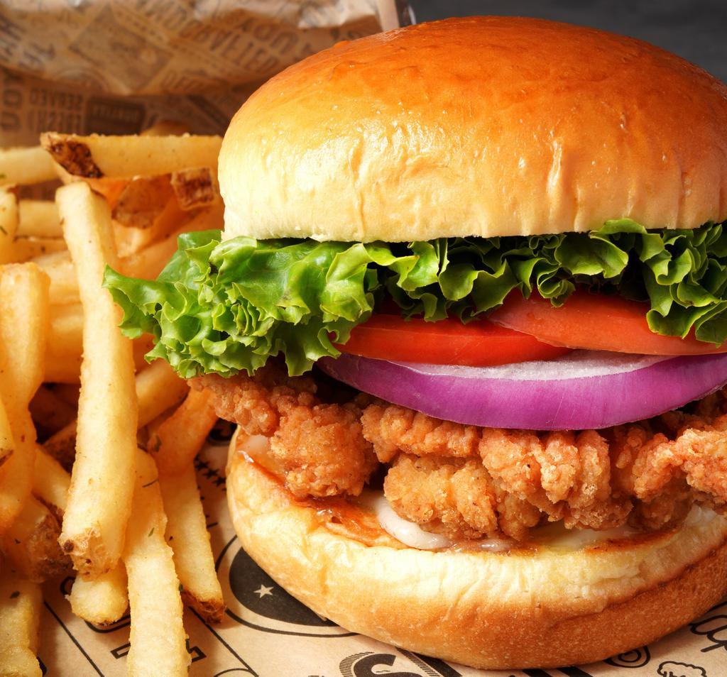 Crispy Chicken Tender Sandwich (1340 Cals) · Crispy fried chicken tenders drizzled with our signature sauce, topped with leaf lettuce, tomato & red onion on a toasted brioche bun.