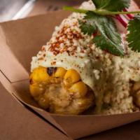 Elote · grilled corn on the cob, cilantro-jalapeno crema + cotija cheese