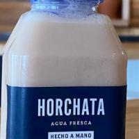 Horchata · A refreshing cold drink made of rice, water, almonds, cinnamon, and sugar.