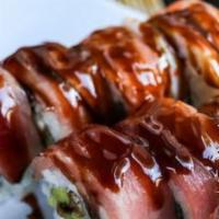 Spider Man Roll · Raw. Fried soft shell crab, cucumber, avocado, kaiware, topped with tuna, salmon, shrimp, an...