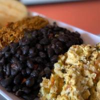 Criollo · Arepa, Shredded beef, scrambled eggs, grated white cheese  and black beans.