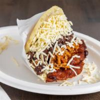 Pabellon Arepa · Arepa filled with black beans. shredded beef, sweet plantain and grated white cheese / Arepa...