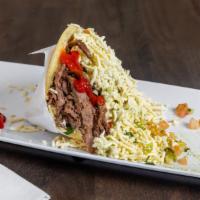 Angus Beef Arepa  · Arepa filled with grilled Angus beef, pico de gallo, green sauce and grated white cheese / A...