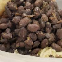 Domino Arepa · Arepa filled with Black Beans and Grated White Cheese / Arepa rellena de Frijoles Negros y Q...