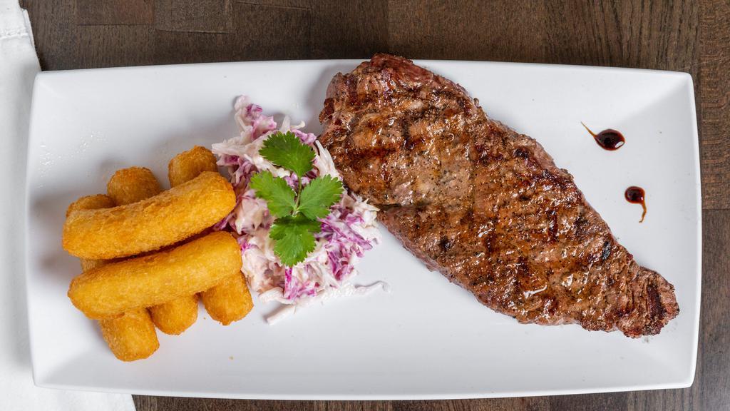 Ny Steak  · Comes with 2 sides of your choice / Filete de carne con 2 acompañantes de tu preferencia