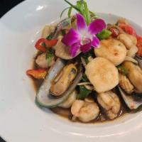 Spicy Basil With Mixed Seafood · Stir fired with red onion, bell peppers, Thai basil leaves with shrimp, scallop, mussel, cal...