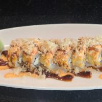 Golden Tiger Roll · Shrimp tempura, cream cheese, avocado. Deep fried and topped with spicy crab, tempura flake,...