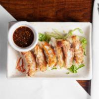 Potstickers (Chicken & Pork)(6) · Pan-fried chicken and pork dumplings served with sweet garlic soy sauce.