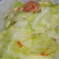 Thai House Salad · Lettuce, cucumber, and tomatoes, served with Thai chili or ranch dressing.