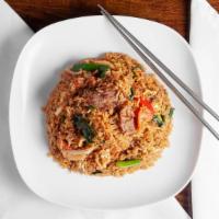 Spicy Basil Fried Rice · Mildly spicy. Egg, diced onion, scallion, green pepper, tomatoes and basil leaves in chili s...
