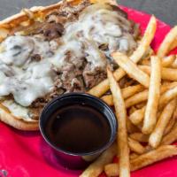 Loaded French Dip Sandwich · Dry rubbed and house braised roast beef piled high with mushrooms, onions, and provolone. Se...