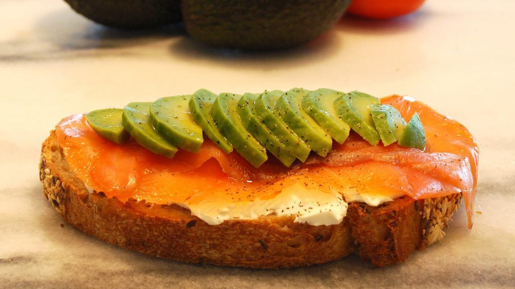 Smoked Salmon Avocado Toast · Freshly baked Multigrain toast, cream cheese, Norwegian smoked salmon, avocado