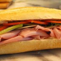 Italian Ham & Provolone Cheese  · French Baguette, Imported Italian ham, provolone cheese, lettuce, tomato, & mayonnaise