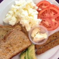 Avocado Breakfast Special · One half avocado, tomato slices, egg whites, toast, and fakin bacon.